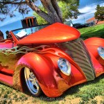 2014 Murrieta Father's Day Car Show: 1937 Ford Roadster. Beautiful burnt orange paint with flames running down the sides and ghost flames on the fenders and hood.